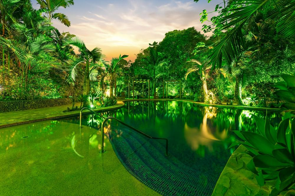 Serpentine pool at dusk, Casa del Rio, La Fortuna